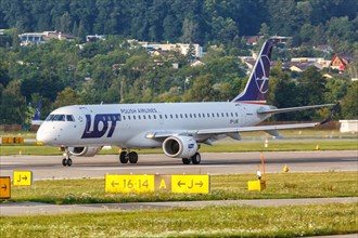 An Embraer 195 aircraft of LOT Polish Airlines with registration mark SP-LNE at Zurich Airport