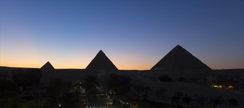 The three main pyramids at sunset