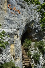 At the entrance to the Orjobet cave on the Orjobet geological trail to the summit of Mont Saleve