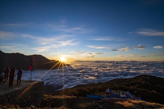Sunrise over cloud cover in the high camp of Machapuchare
