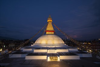 Boudha Stupa with the all-seeing eyes of Buddha in the evening light