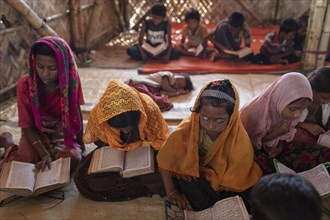 Girls reading in a madrasah