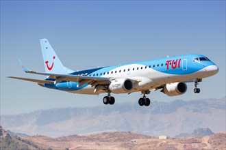 A TUI Embraer ERJ190 with the registration OO-JVA lands at Malaga Airport