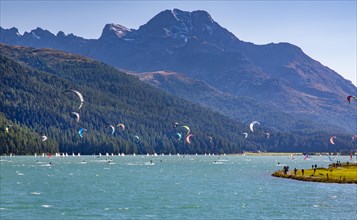 Lake Silvaplana with kitesurfers and sailing boats