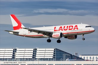 A Lauda Airbus A320 aircraft with the registration OE-LOI lands at Stuttgart Airport