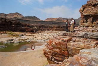 Hikers in the Fish River Canyon, Namibia