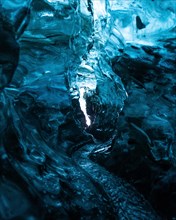 Glacier stream in an ice cave