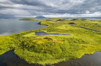 Aerial view of green volcanic crater