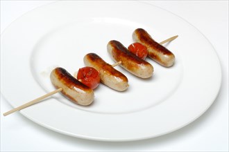 Chipolata sausages on wooden skewers