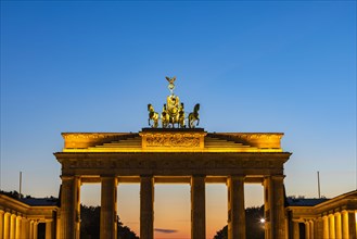 Brandenburg Gate with sculpture of the Quadriga in the evening light