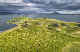 Aerial view of green volcanic crater