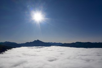 Schafberg and Dragon Wall rising out of the sea of fog