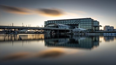 Reflection of the central station at Humboldthafen at sunset