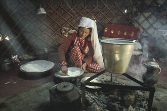 Woman stirring dough