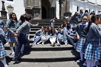 School class in school uniform on the steps of the cathedral