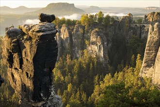 View of the Bastei with Wehlnadel and Wehlgrund to the Lilienstein at sunrise