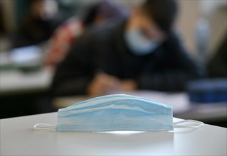 Face mask on school desk