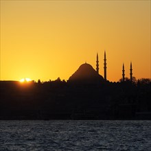 Silhouette of a mosque on the Bosporus at sunset