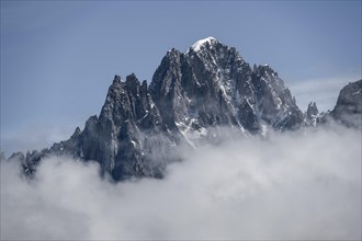 Mountain peak in clouds