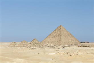 The pyramid of Menkaure next to the queen's pyramids