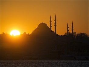 Silhouette of a mosque on the Bosporus at sunset