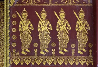 Gilded representations of symbolic temple guards