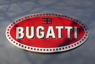 Logo of Bugatti Automobiles S.A.S. on a car dealership