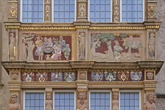 Painted reliefs on the facade of the Tempelhaus