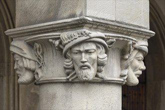 Column capitals with sculptures of the Anabaptist leaders