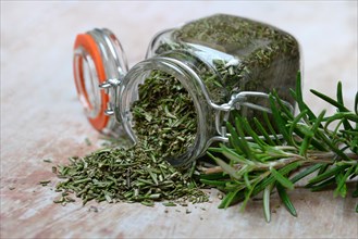 Dried rosemary in glass jar