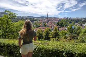 Young woman looking over the city