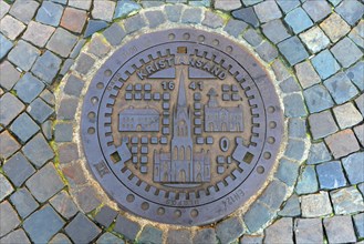 Manhole cover of Muenster's twin city Kristiansand