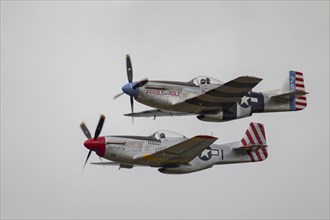 North American Aviation P-51 Mustang two aircraft in flight in United States Airforce markings