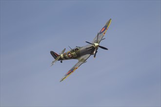 Supermarine Spitfire aircraft in flight in Royal air force markings