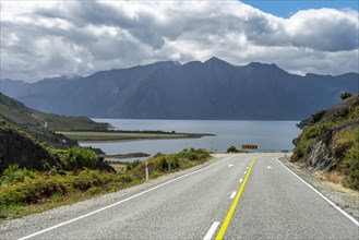 Road with views of mountains and Lake Hawea