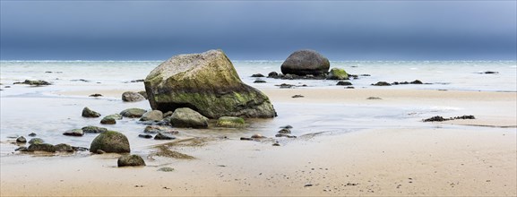 Sandy beach beach with boulders