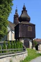 Wooden bell tower of the Roman Catholic Church of St. Michael