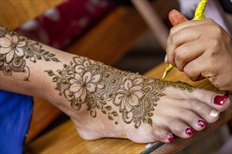 Henna tattoo on foot on a Hindu wedding eve in the island of Mauritius