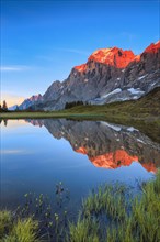 Wellhorn and Engelhoerner with mountain lake