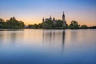 The Schwerin Castle at Lake Schwerin at sunset