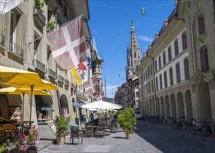 Flags on a row of houses in the old town of Bern