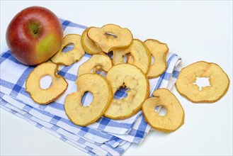Dried apple slices and apples