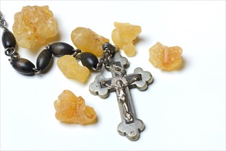 Crucifix and incense resin