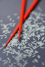Rice grains and chopsticks