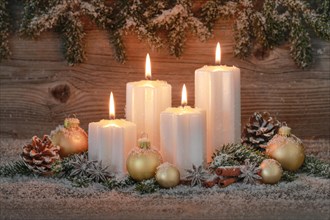 Natural advent decoration with 4 burning candles