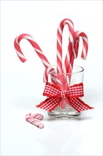 Candy canes in glass