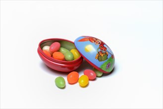 Sugar eggs in tin egg with rabbit figure
