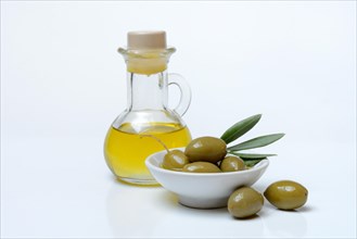 Green olives in shell and bottle olive oil