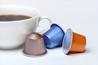 Coffee capsules and coffee cup with coffee