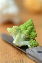 Romanesco cabbage with knife